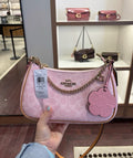 Coach Teri Shoulder Bag in Signature Canvas with Charms — Powder Pink