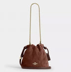Coach Faye Mini Drawstring Bag with Quilting in Suede — Gold/Vintage Brown/Maple